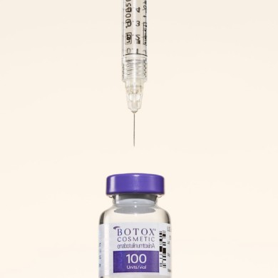 Botox syringe and bottle