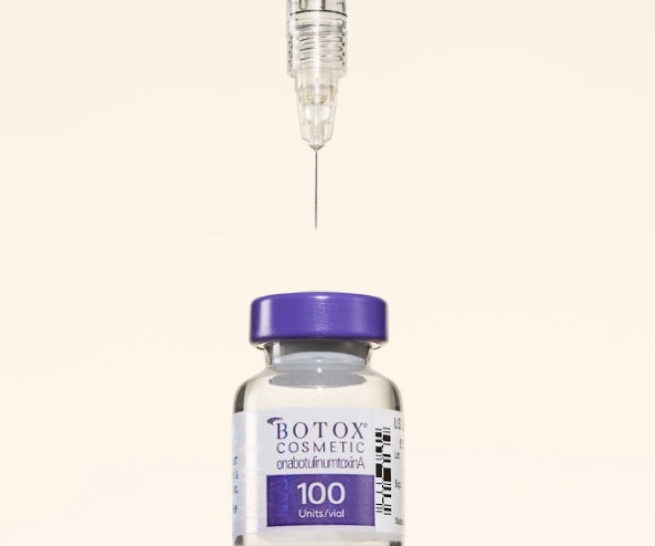 Botox syringe and bottle